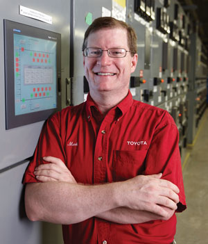If you want to know just how much an automaker plant depends on its energy to function, just shut down the plant for a minute by shorting out a light fixture. Mark Rucker knows. Rucker oversees Toyota Motor Manufacturing Kentucky’s (TMMK) electrical systems. “I actually shut the power off to the whole plant by changing out an LED light bulb. I have also tripped the plant power off by opening a door. That was in my second week here.” Today, Rucker is a different kind of green, having led the team of electrical specialists who keep the multibuilding complex humming and maintain the plant’s extensive metering system. The knowledge gained from the data captured led to the changeout of old equipment with energy-efficient equipment and the streamlining of operations, which cut the energy consumption per vehicle in half.